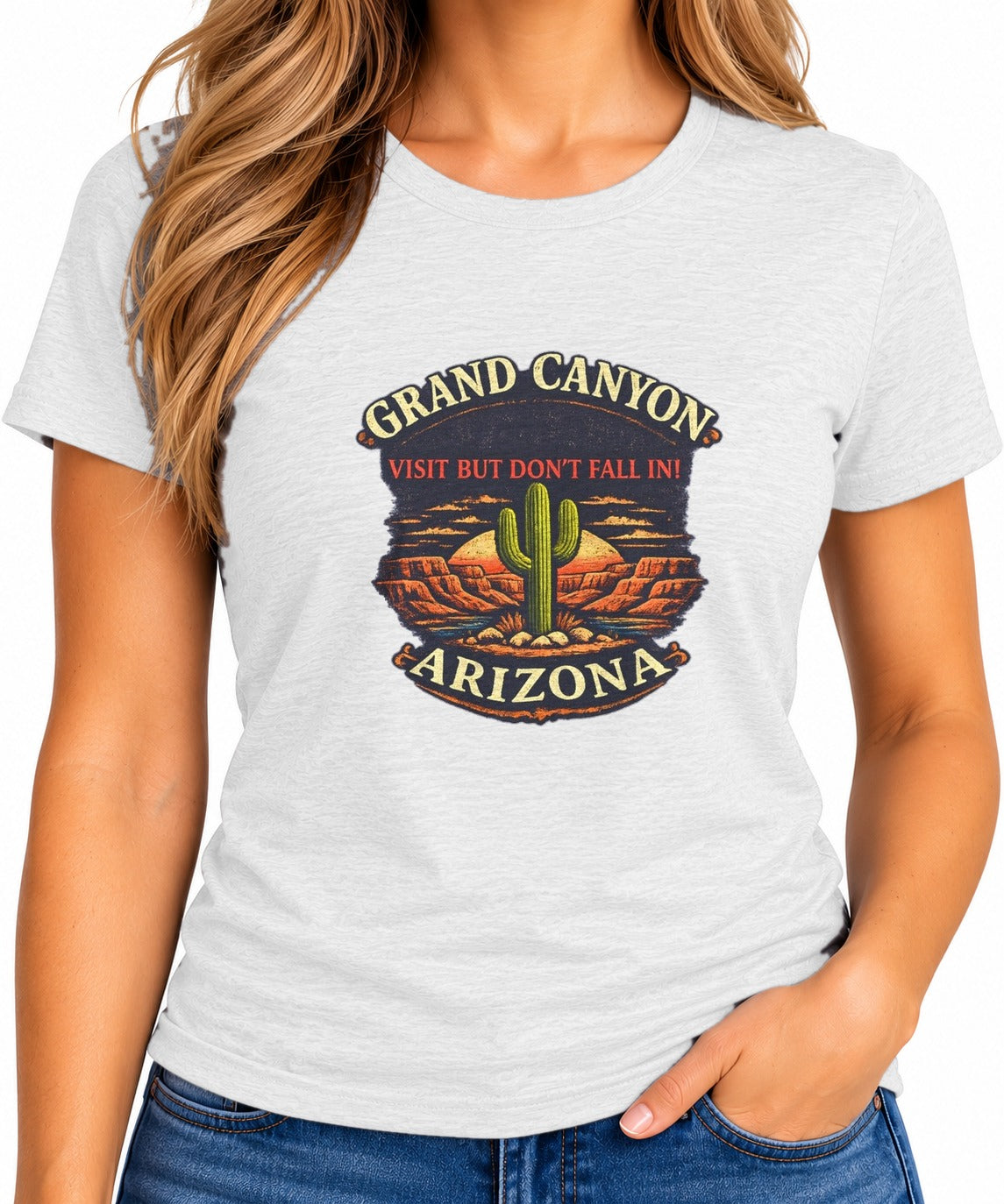 Woman wearing the Grand Canyon Visit But Don't Fall In T-Shirt