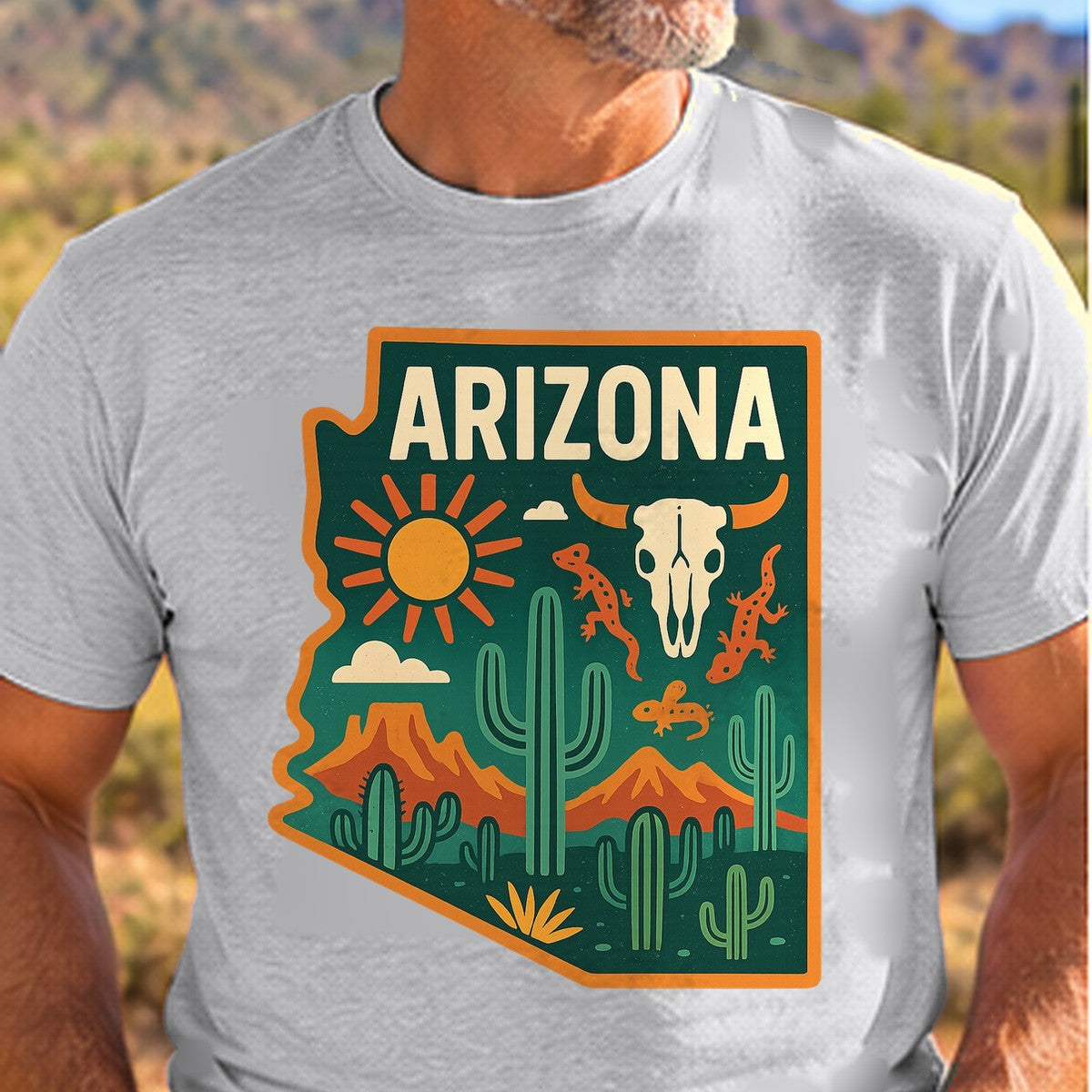 Cactus Skull Sunset Arizona T-shirt worn by a man in the Arizona desert