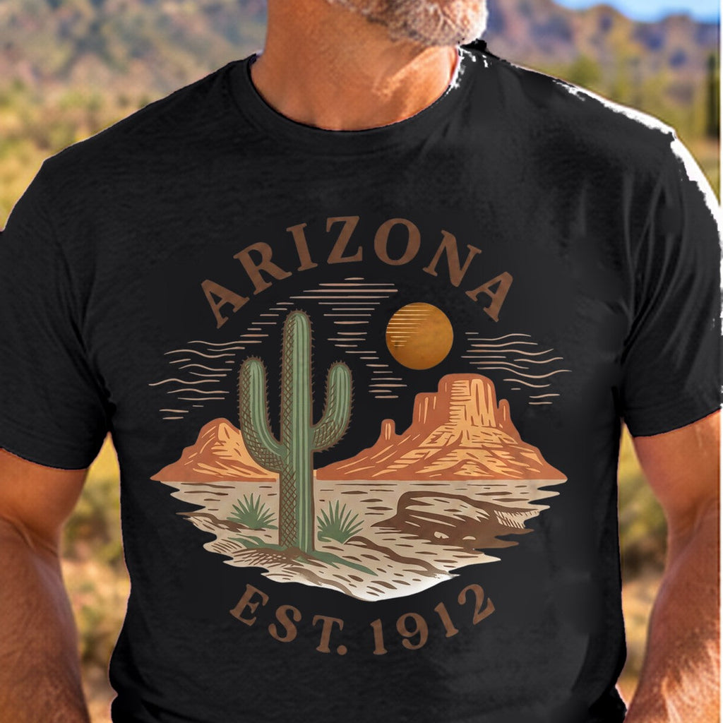 Desert Graphic Est 1912 Arizona T-shirt worn by a man in the Arizona desert
