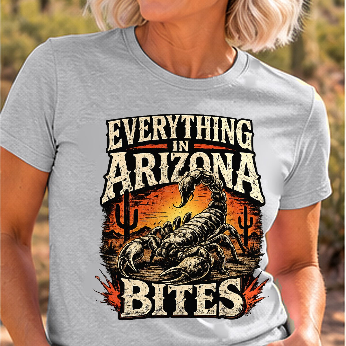 Everything Bites Arizona T-shirt worn by a woman in the Arizona desert