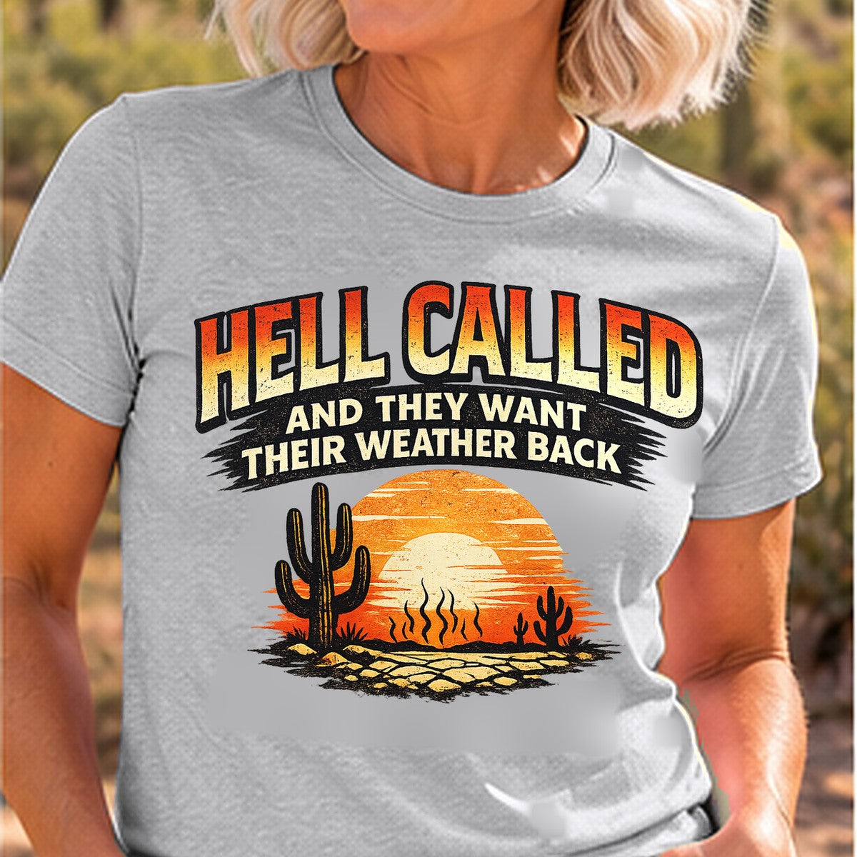 Hell Called Sunset Arizona T-shirt worn by a woman in the Arizona desert