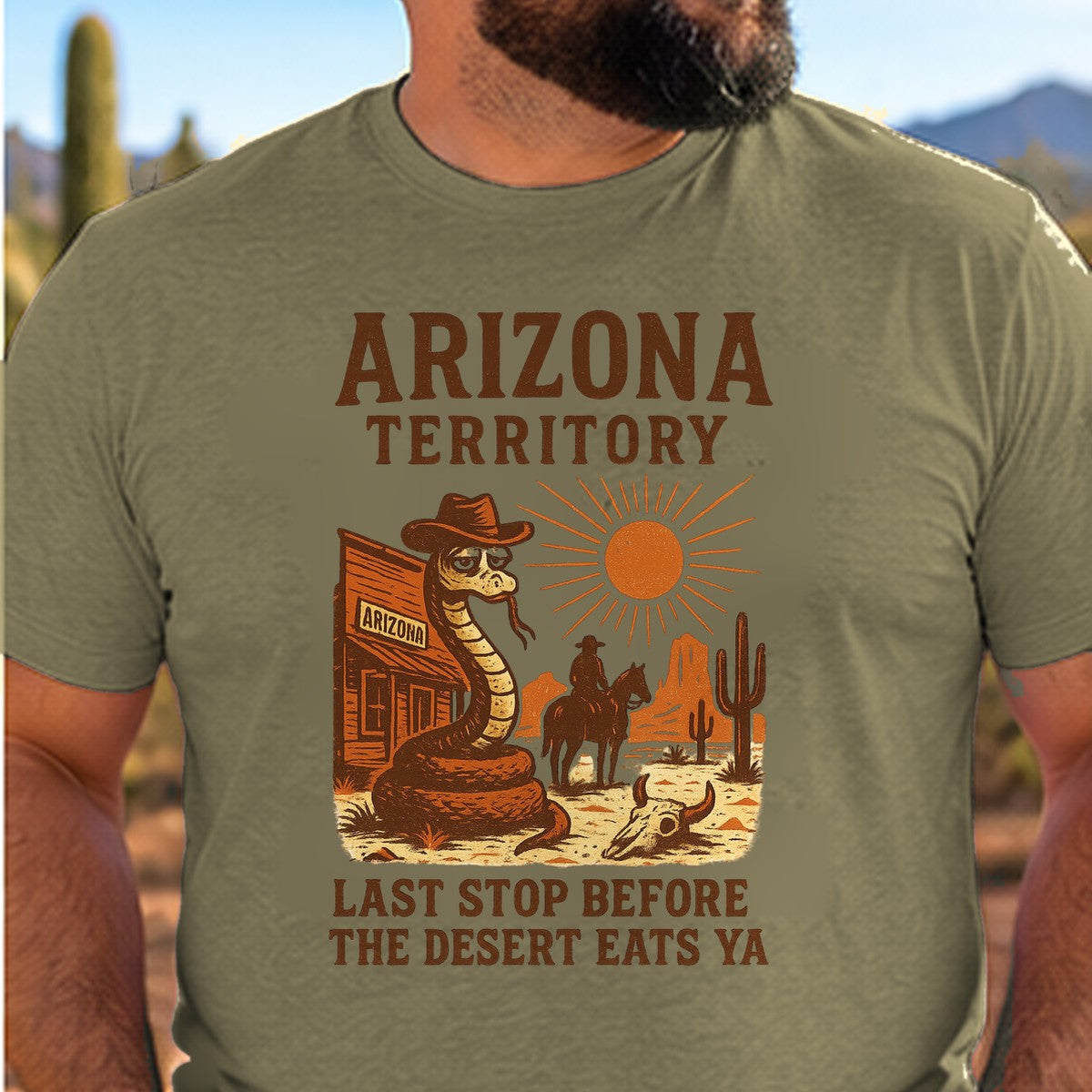 Last Stop Before the Desert Arizona T-shirt worn by a man in the Arizona desert