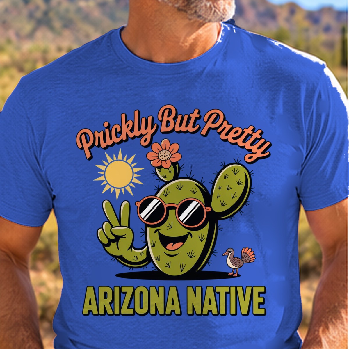 Prickly But Pretty Arizona T-shirt worn by a man in the Arizona desert