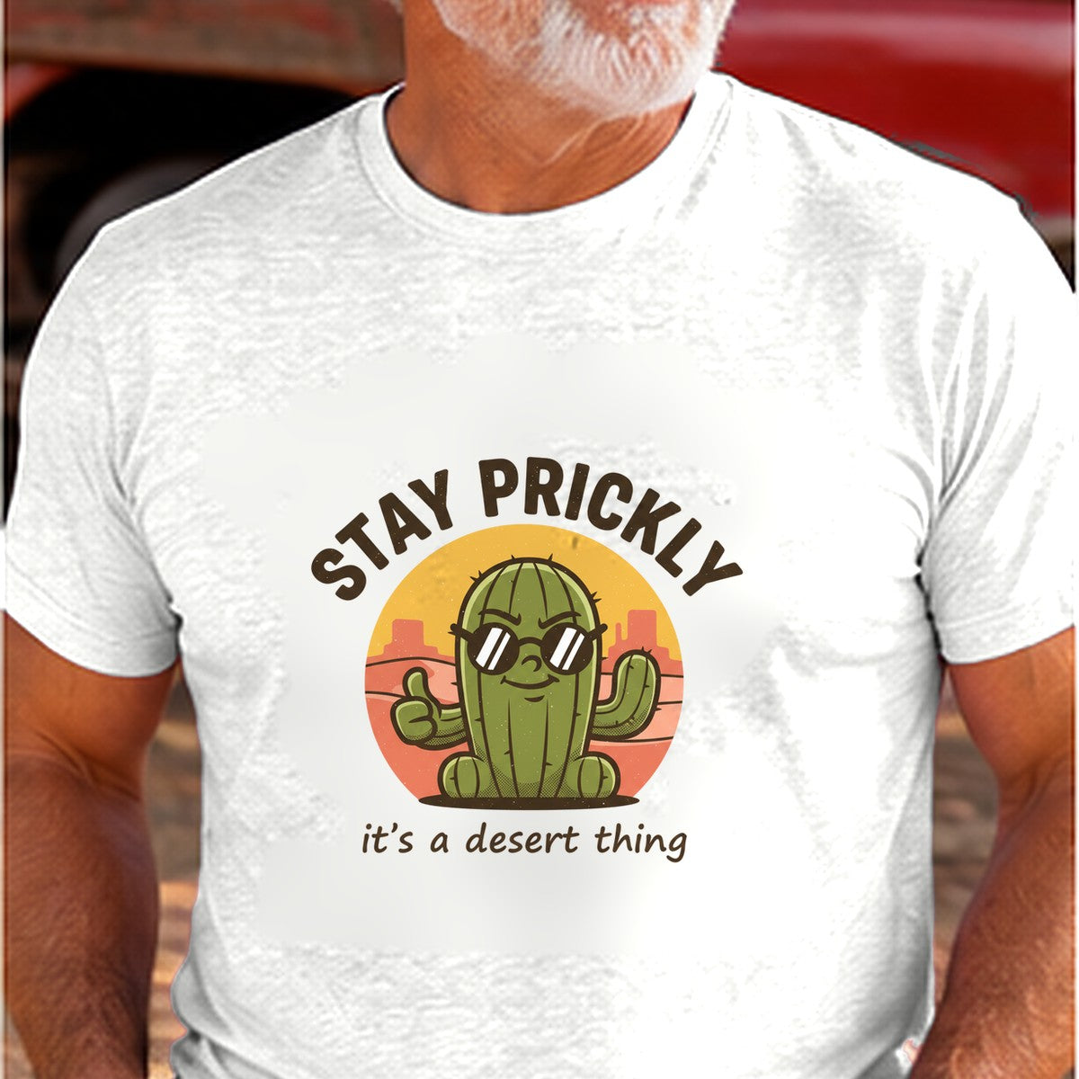Stay Prickly Arizona T-shirt worn by a man in the Arizona desert