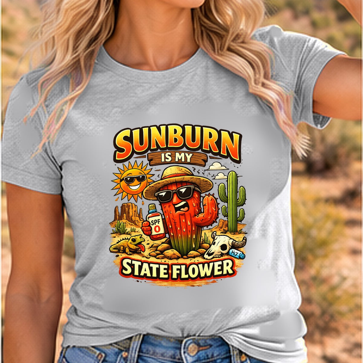 Sunburn State Flower Arizona T-shirt worn by a woman in the Arizona desert